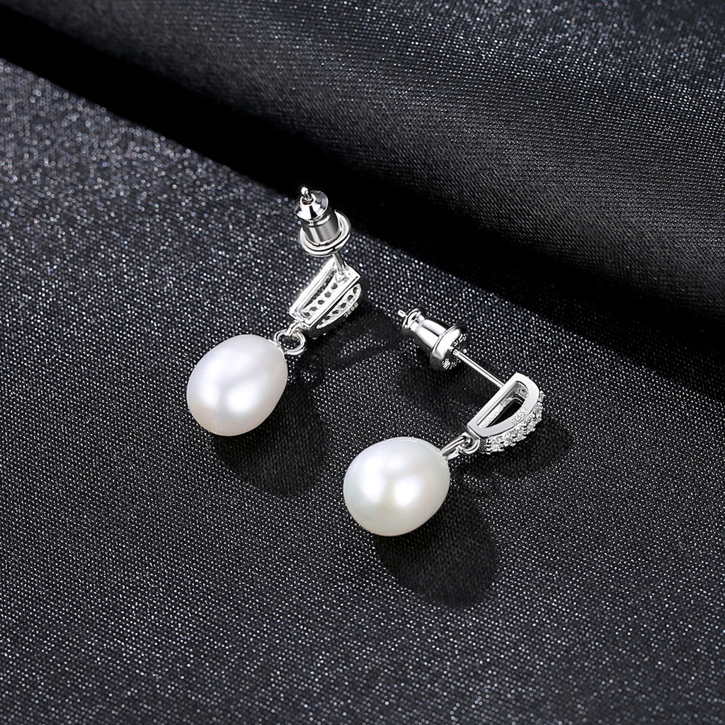 Bridesmaid gift earrings, sterling silver and natural freshwater pearl stud earrings.