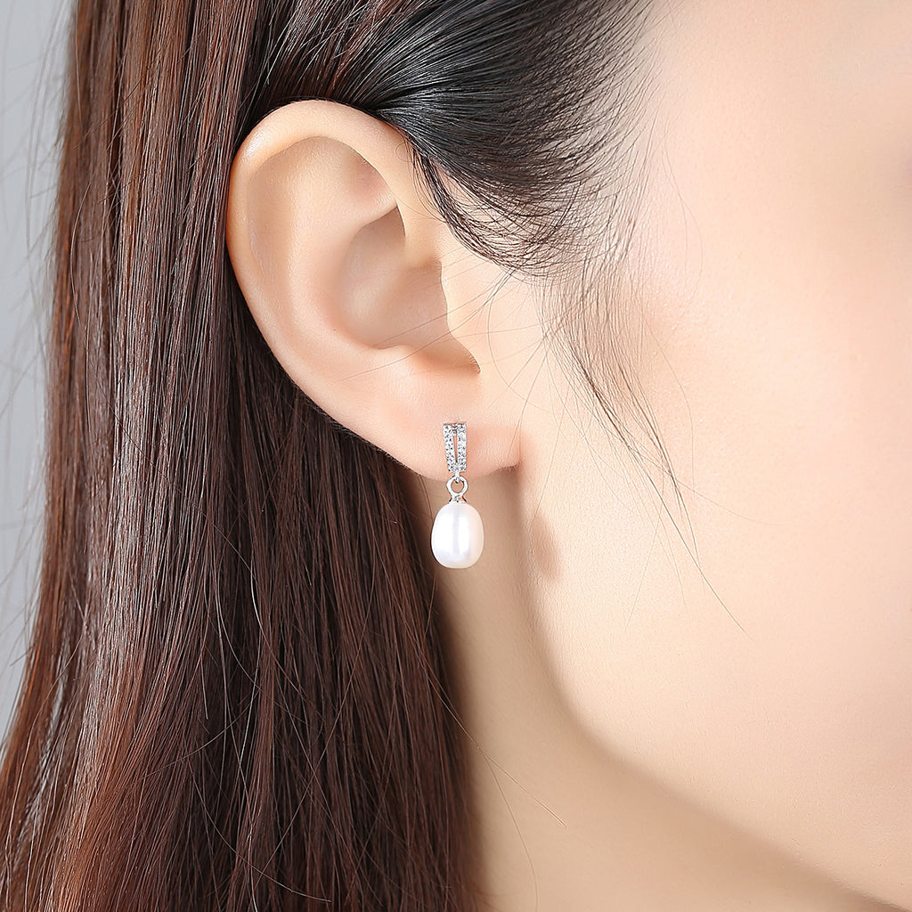 Bridesmaid gift earrings, sterling silver and natural freshwater pearl stud earrings.